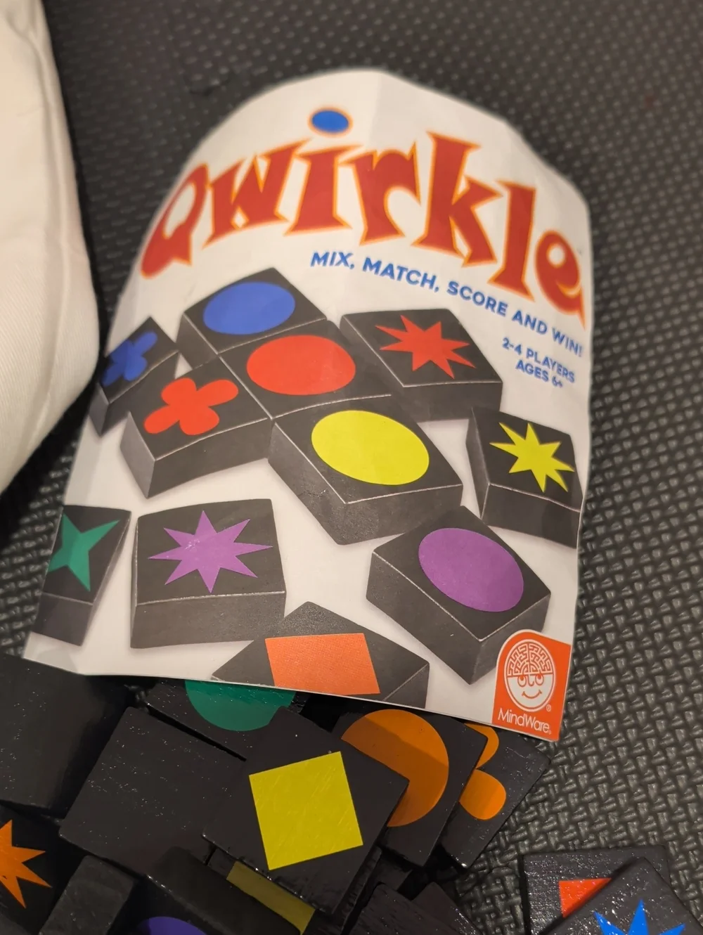 Qwirkle Tile Matching Game - Colorful Black Tiles